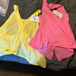 ZYIA Split back tanks: new with tags, yellow and pink.